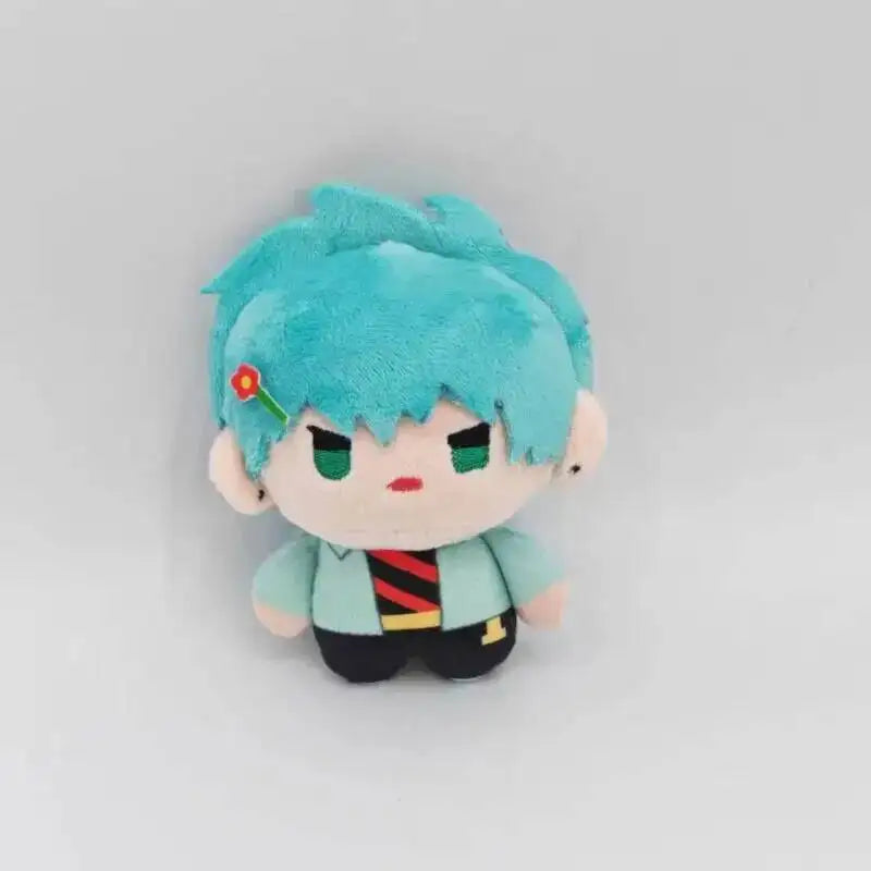 A plush doll of an anime alien character with bright blue hair and green eyes wearing a teal shirt.