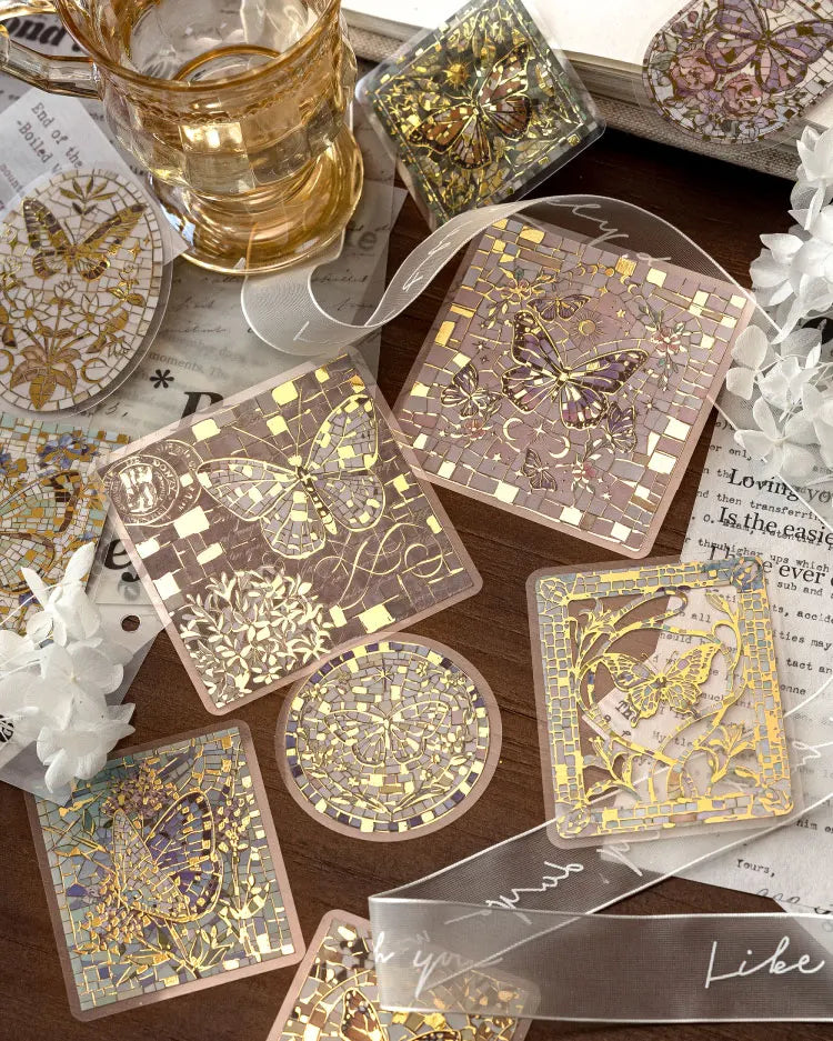 A collection of decorative gold and purple glitter PET stickers for journaling and scrapbooking