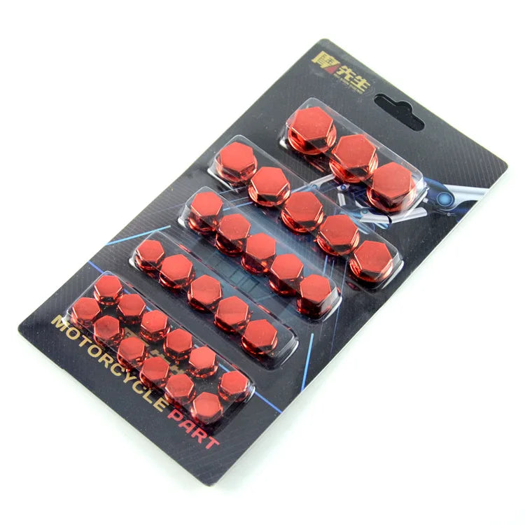 A set of red decorative screw covers for motorcycle parts packaged in a black plastic tray.
