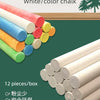A box of white and color chalk sticks, showing various colors arranged in a wooden frame.