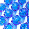 A collection of handmade resin D20 dice featuring large blue and purple liquid swirls.