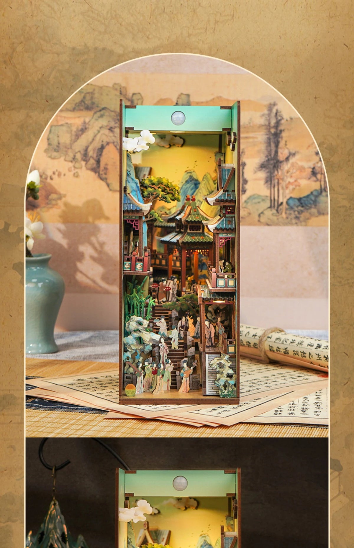 A DIY book nook kit featuring a detailed miniature scene with LED lighting and a dust cover displayed in an arched frame.