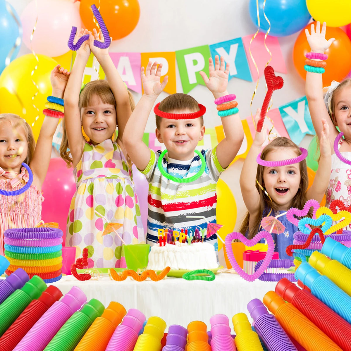A colorful display of telescopic pop tubes in various bright colors arranged on a white table.