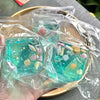Clear blue ocean block squishy stress balls filled with sea shells and glitter