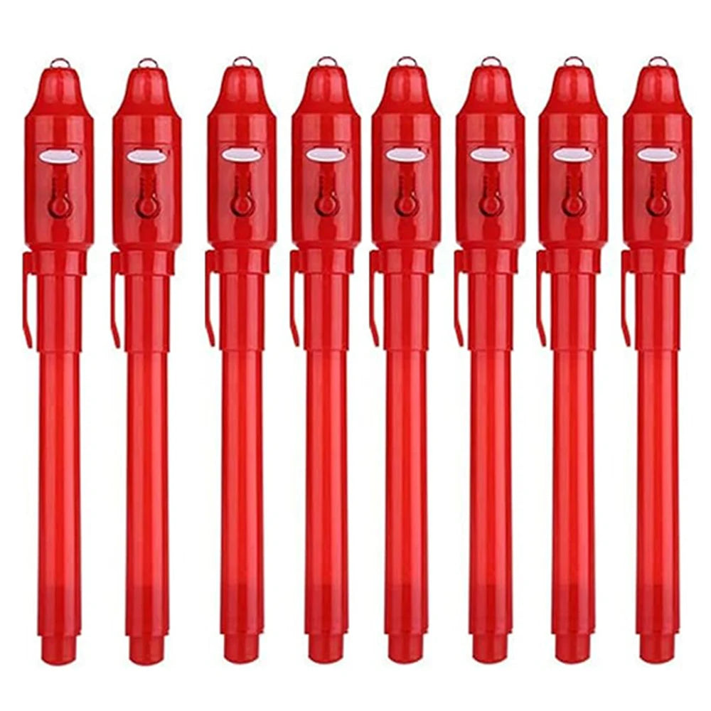 A set of red invisible ink spy pens with UV light for secret messages