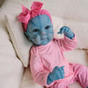 A handcrafted reborn baby doll with a blue silicone vinyl body wearing a pink striped outfit and a pink bow.