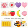 A collection of various squishy fidget toys including heart shapes, a strawberry, a banana, and cute animal figures.