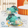 A green jellyfish toy with glowing lights and tentacles is shown next to an orange plastic container.