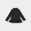 A dark navy knit sweater with a ruffled collar and a matching skirt or pants set for a toddler.