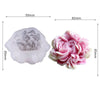 A pair of pink floral silicone candle and resin molds, showing the mold and the finished flower.