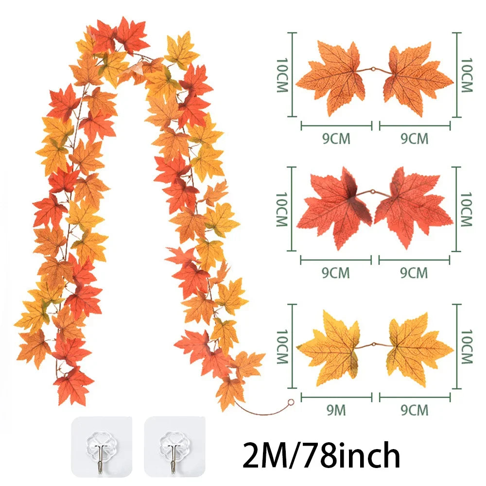 Artificial fall maple leaf garland featuring orange and yellow leaves for autumn decoration