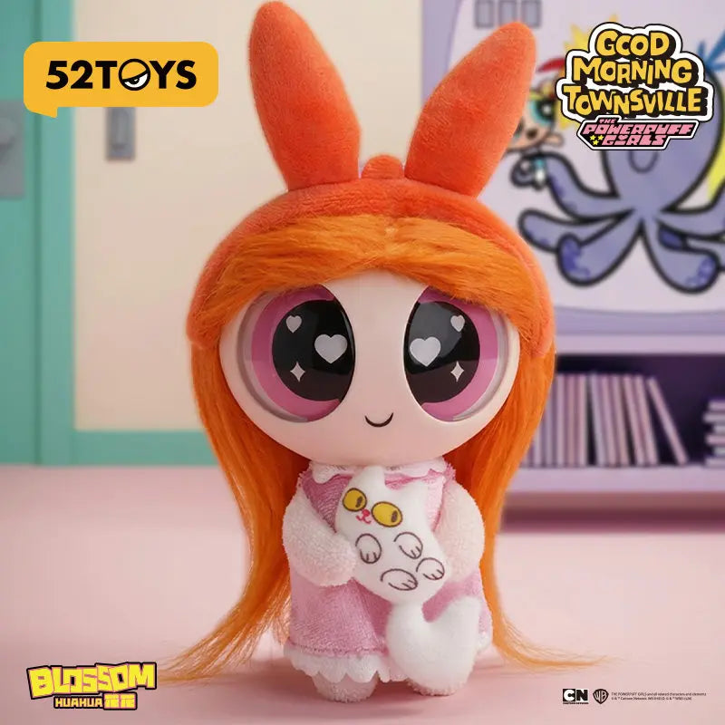 A collectible figure of Blossom from The Powerpuff Girls series with orange hair and pink outfit.