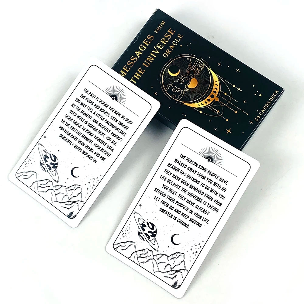 A set of Messages From The Universe Oracle cards and a black deck box with an astrological design.