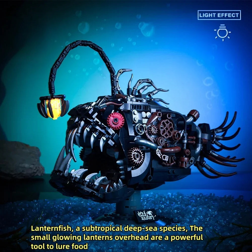 A detailed mechanical lantern fish model kit with glowing lights, set against a blue underwater background.