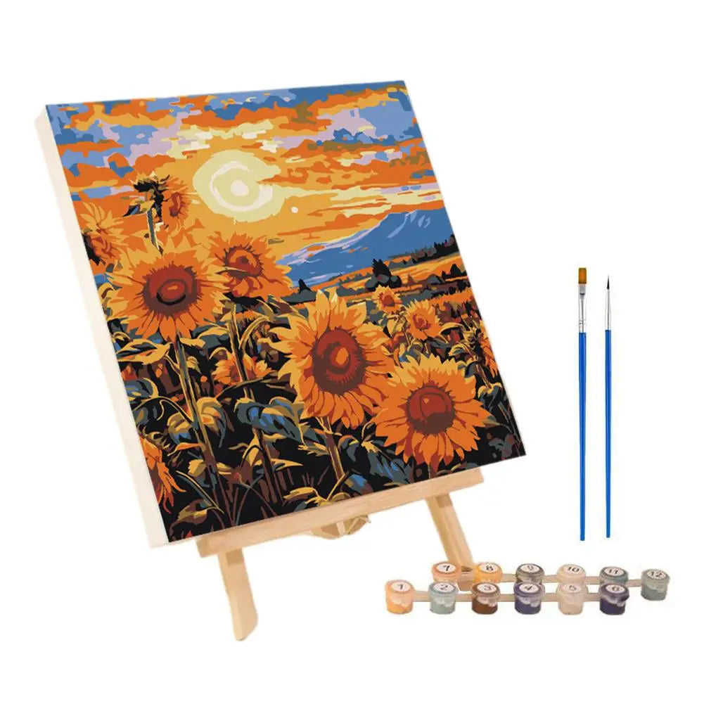 A paint by numbers kit featuring an abstract sunset landscape painting of sunflowers and mountains.