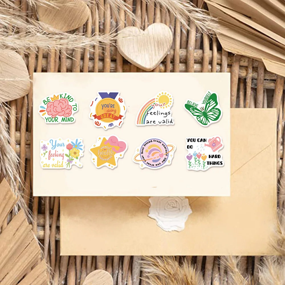 A collection of colorful heart-shaped stickers with positive mental health messages like You're great and Your feelings are v