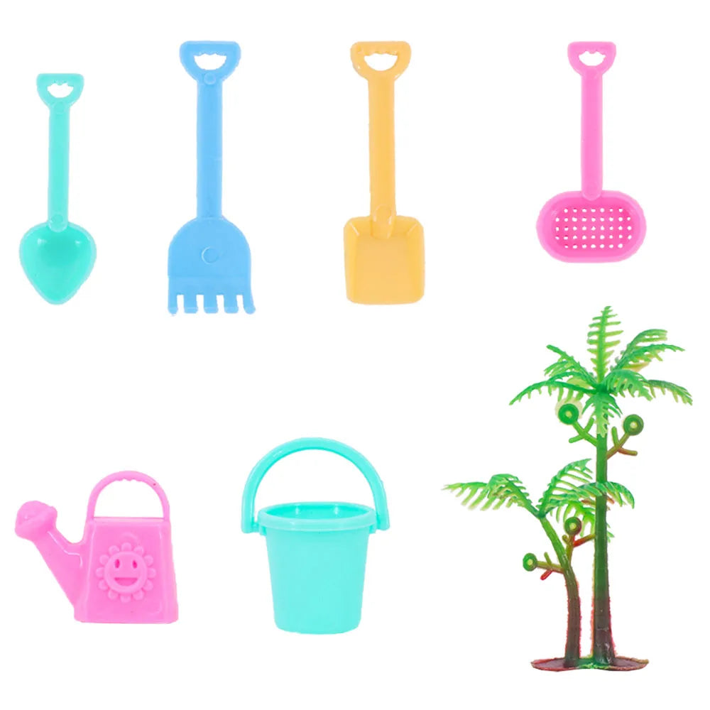 A set of pink, yellow, and blue mini dollhouse cleaning and medical accessories including spoons, spatulas, and a bucket.