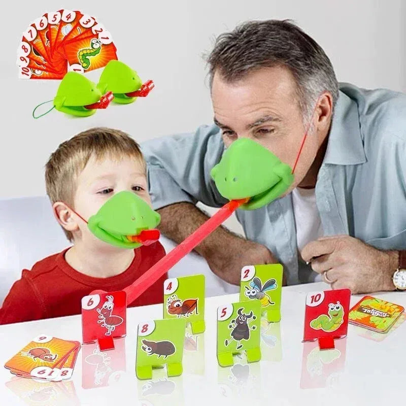 A man and a child play a card game using frog masks and tongue-catching cards on a table.