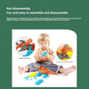 A child is assembling or disassembling a dinosaur toy set with an electric drill and screwdriver.