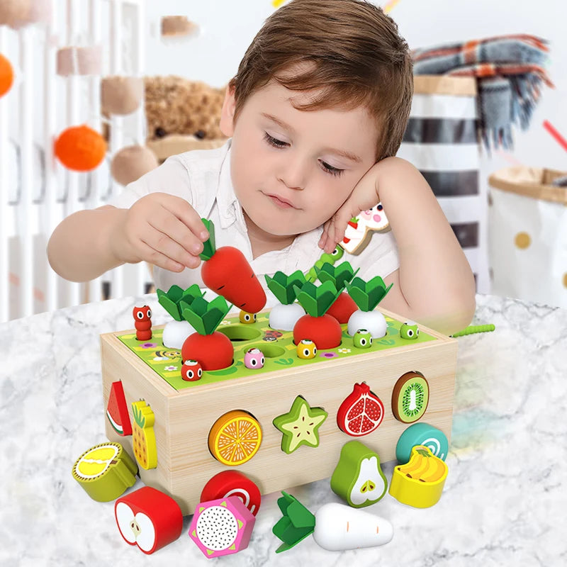 A child is playing with a wooden shape-matching radish cart toy featuring various colored and shaped vegetables.