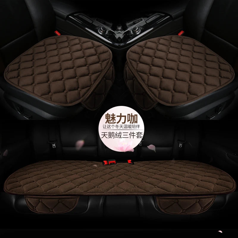 A set of three brown quilted plush anti-slip car seat cushions shown in the interior of a car.