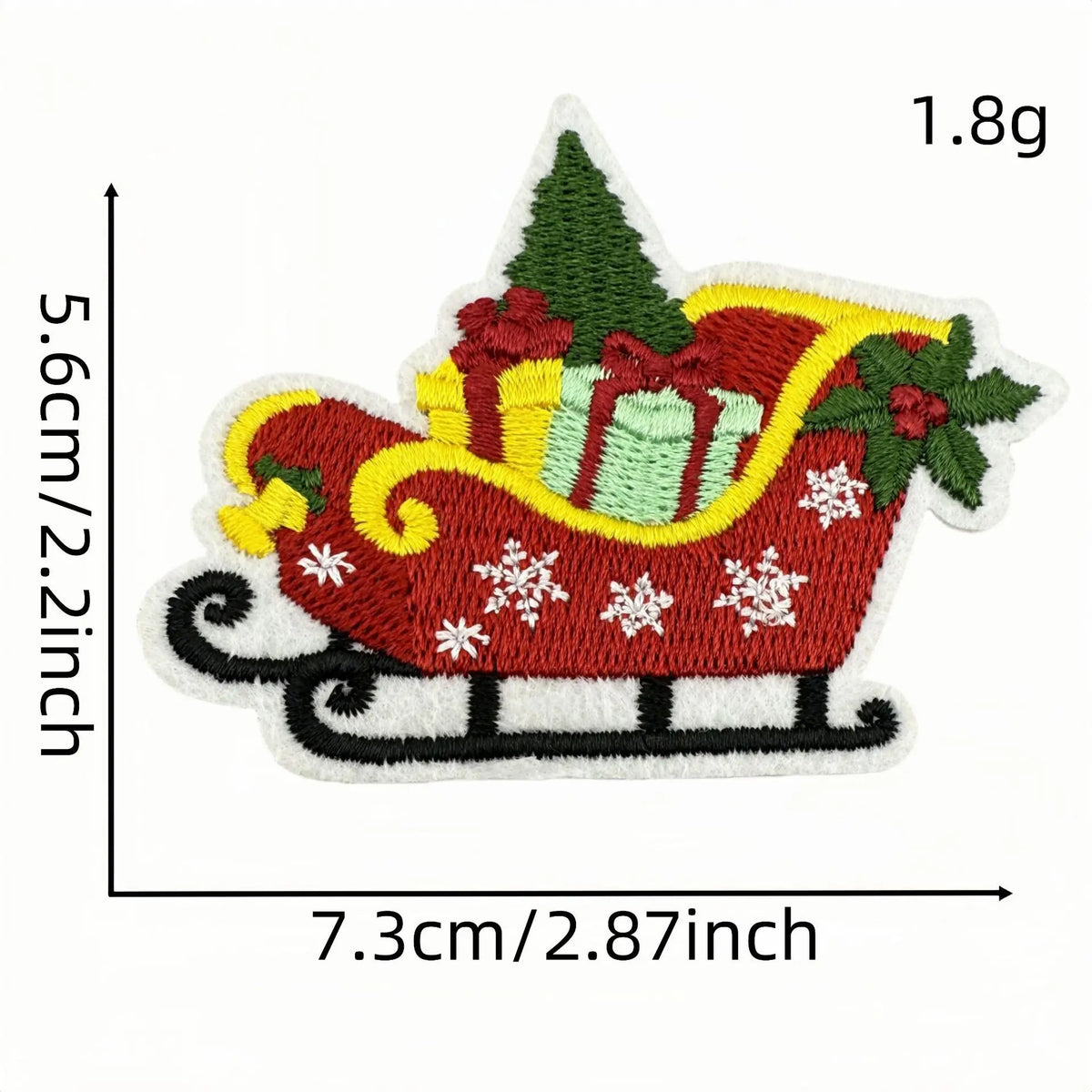 An embroidered iron-on patch depicting a festive sleigh loaded with gifts and decorated with Christmas greenery.