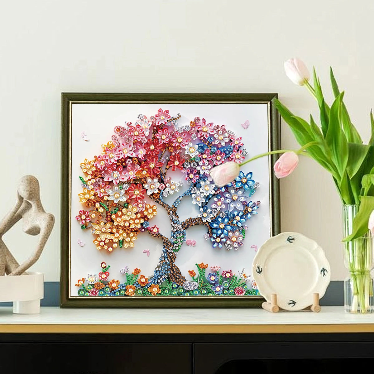 Diamond art painting kit featuring a colorful tree with pink, orange, and blue flowers on a canvas.