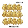 Twelve artificial gold tropical palm leaves measuring 16x20cm for party decor