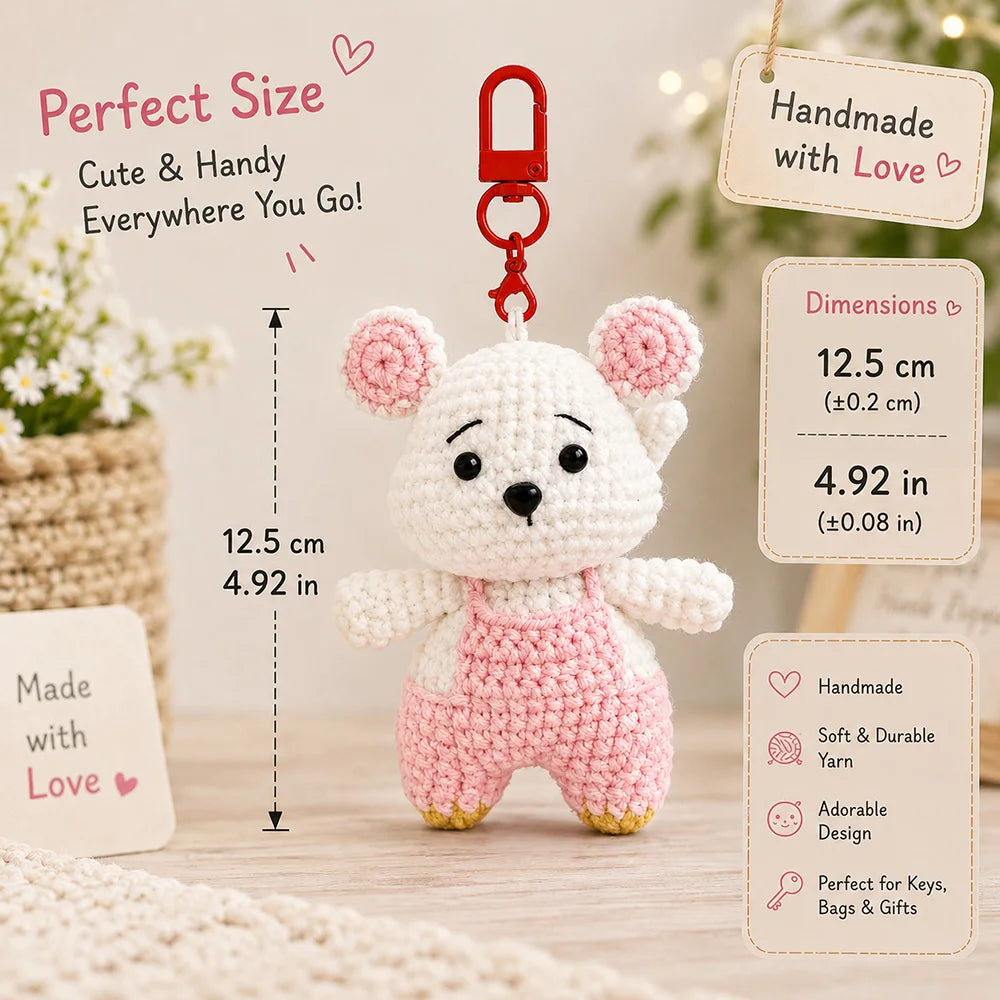 A white crochet donkey doll with pink accents hangs from a key ring, displayed next to size and care information.