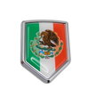 A chrome 3D emblem featuring the Mexican flag design with an eagle and laurel wreath.