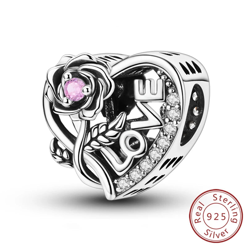 A sterling silver heart charm featuring a pink rose and the intertwined letters L O V E.