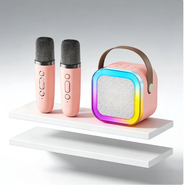 A pink Bluetooth karaoke speaker system with a wireless microphone and a colorful light display.