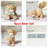 A set of four cute bear figures including a seated, standing, and lie down pose, with accompanying baby shower signs.