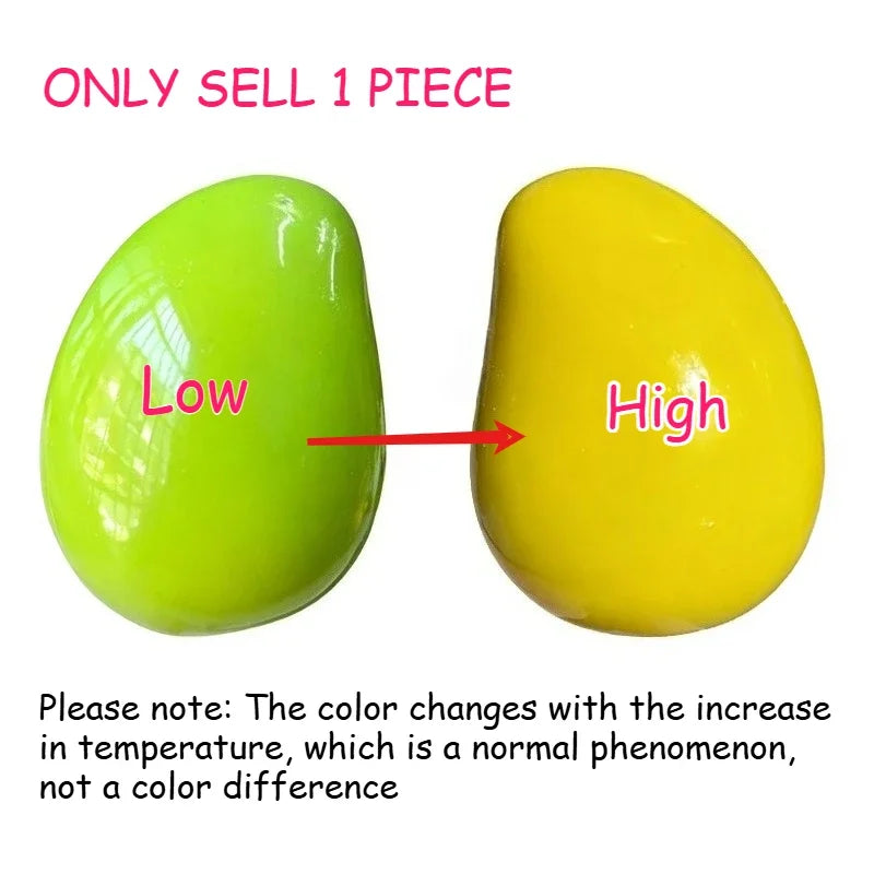 Two squishy stress balls, one low yellow and one high yellow, demonstrating color change with temperature.