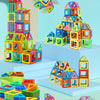 A collection of colorful magnetic building blocks and construction toys arranged in various shapes and structures.