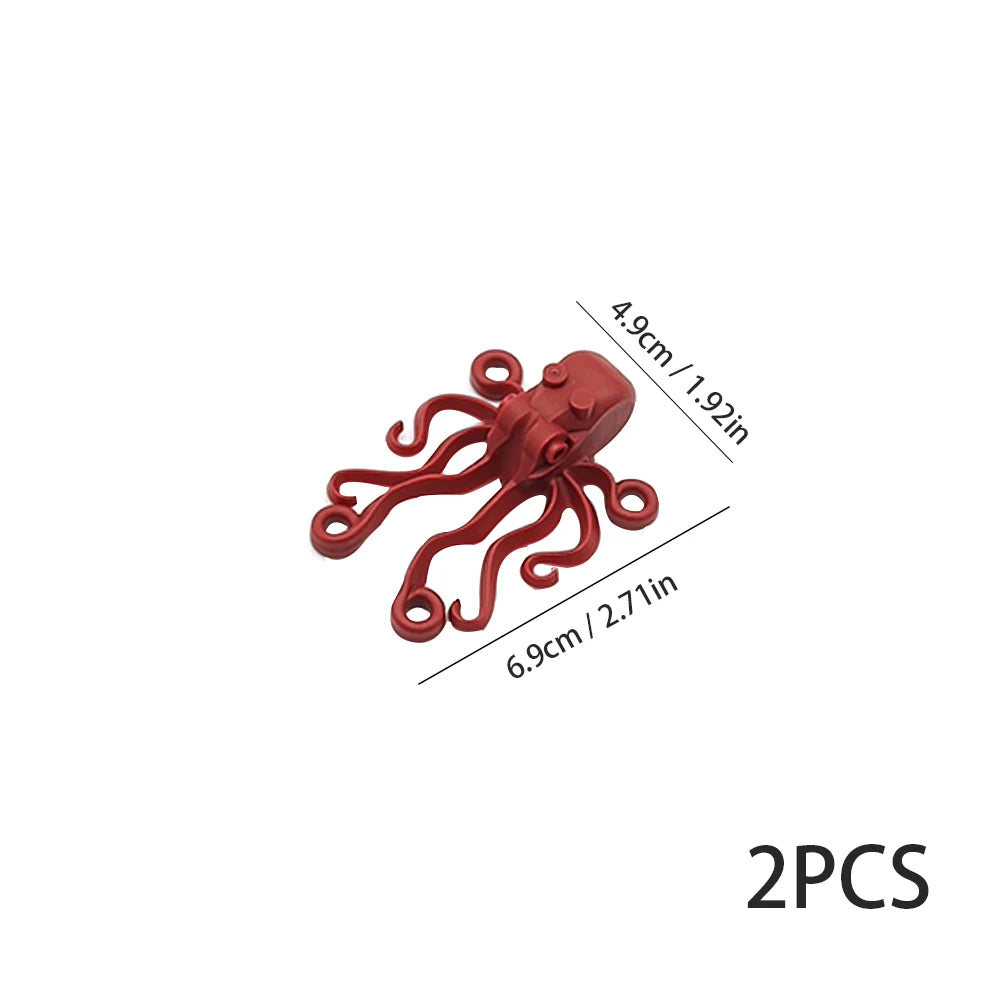 Two red marine creature building blocks with dimensions 4.9cm by 6.9cm.
