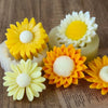 Yellow and orange silicone sunflower molds for candle making and soap crafting