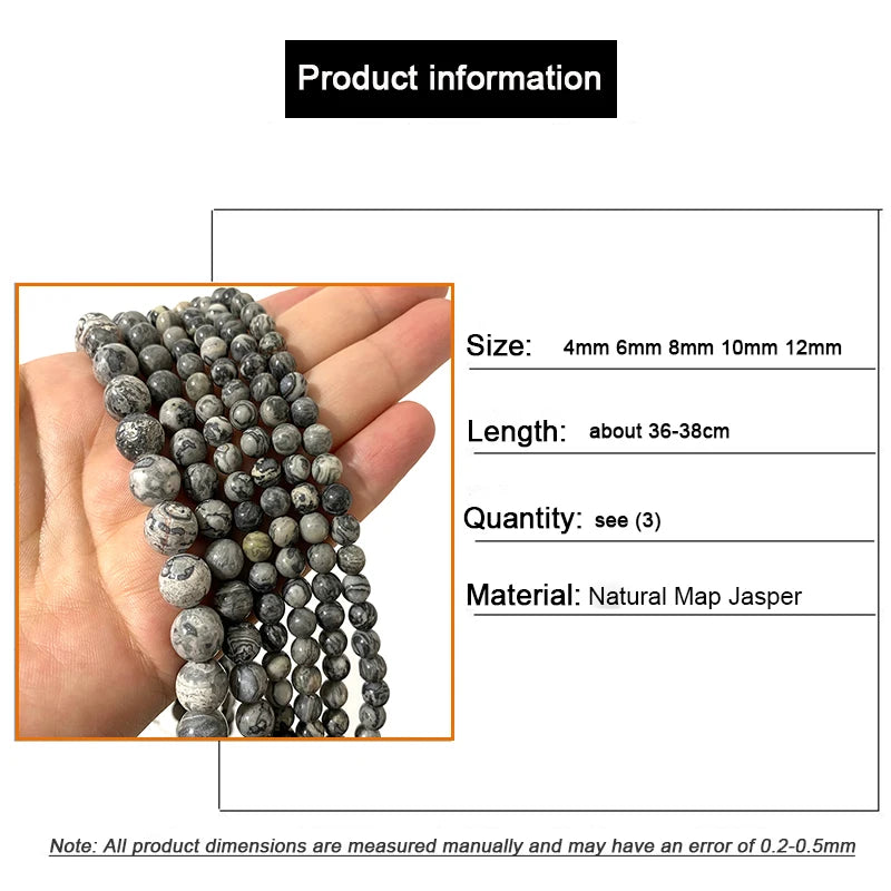 A hand holds a strand of natural map jasper loose beads for jewelry making, showing various sizes and lengths.
