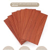 A stack of red sandalwood board pieces showing the natural material selection for DIY crafts.