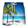 Men's beach swim shorts featuring a tropical coconut tree print against a turquoise ocean background.
