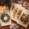 A pack of ten sheets of embossed Christmas adventure themed decorative paper featuring festive holiday designs and ornaments.