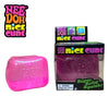 A pink glitter ice cube sensory fidget toy in its packaging and loose form.