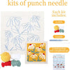 Punch needle embroidery kit featuring a flower pattern with yarn and tools