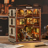 A detailed wooden model kit of a fossil museum with arched windows and internal displays.