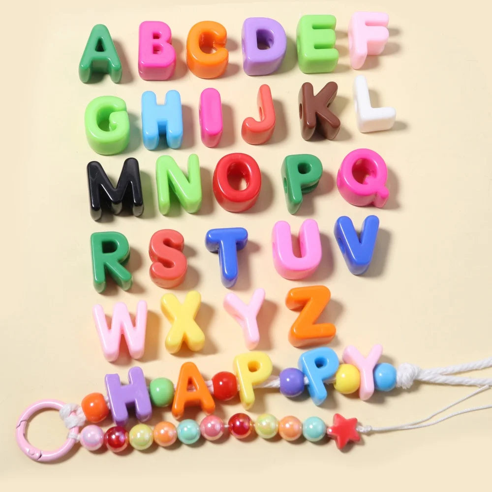 A collection of colorful acrylic alphabet beads arranged in alphabetical order.
