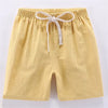 Yellow linen shorts for kids with an adjustable elastic waist