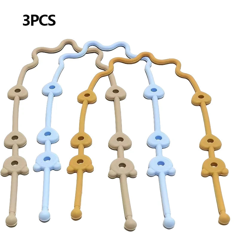 Three silicone pacifier clips with anti-drop chains in beige and light blue colors