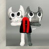 A plush toy resembling a cat face with large eyes and gray fur, displayed against a gray background.