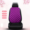 A black car seat cushion with a purple quilted cover, featuring text indicating warmth and anti-slip properties.
