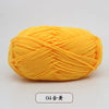 A ball of bright yellow pre-dyed milk cotton yarn for knitting and crochet.